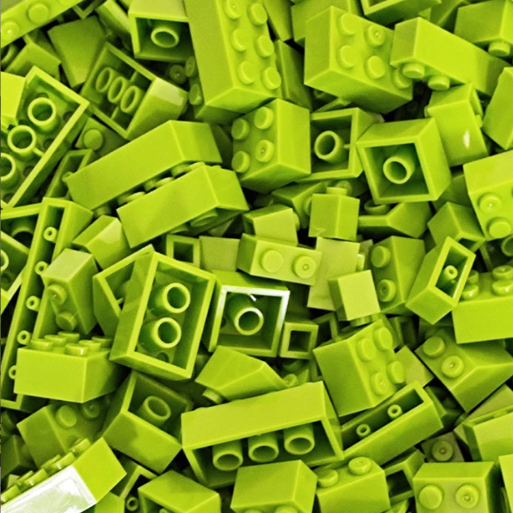A pile of bright lime green building blocks for creative DIY projects.