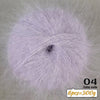 A ball of light purple long-haired alpaca blend yarn used for knitting.