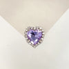 A heart-shaped gemstone pendant featuring a purple amethyst stone surrounded by clear rhinestones.