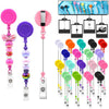 A collection of beadable badge reels with retractable clips in various colors and designs displayed on a white background.
