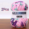 A skein of pink and purple soft chunky t-shirt yarn is shown, packaged as a 2-pack.