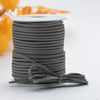 Roll of gray velvet faux suede braided ribbon for crafting and gift wrapping