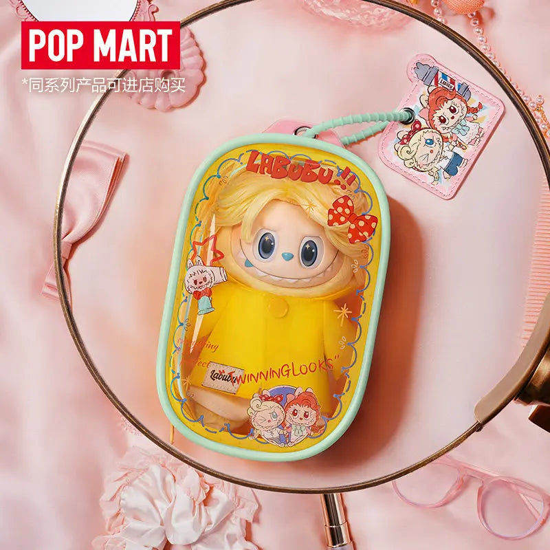 A yellow doll bag pendant keychain featuring a character from the LABUBU The Monsters Hair Salon series.