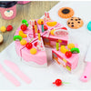 A pink pretend play tea party set featuring food items like cakes, fruits, and pastries for children.