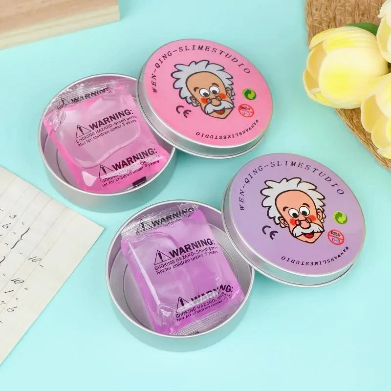 Three containers of purple liquid glass crystal slime with a cartoon face design are displayed on a light blue surface.