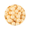 A pile of assorted light beige silicone beads for DIY jewelry making
