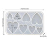 A white silicone mold set with various heart and teardrop shapes for making epoxy resin jewelry.