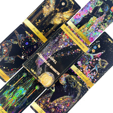 A collection of tarot cards featuring floral and mystical imagery, presented in a deck box.