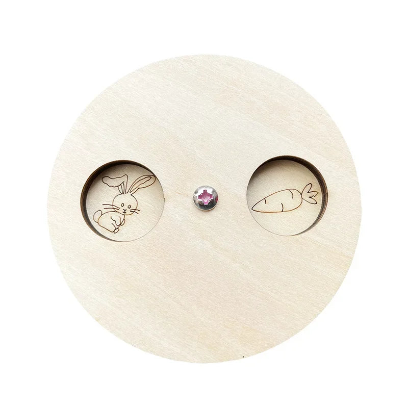 Montessori wooden busy board featuring a rabbit and a fish cutout on a light wood background