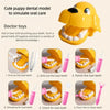 A yellow puppy dental model toy used to simulate oral care with various tools for children.