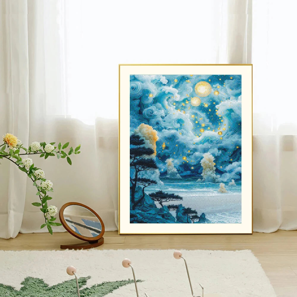 A framed painting kit depicting a night starry sky scenery with blue and yellow tones.