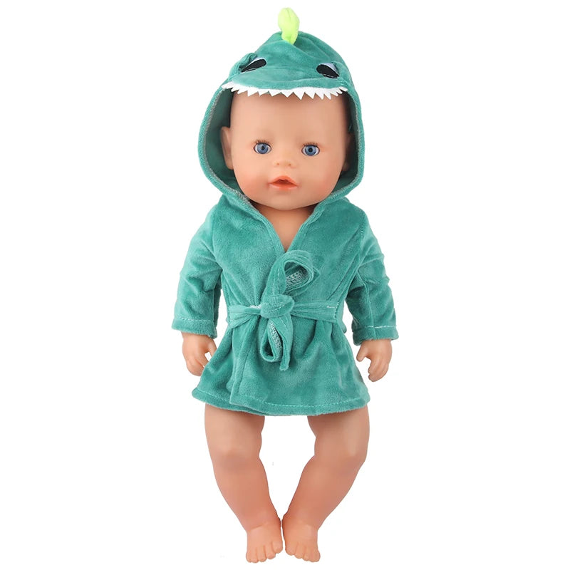 A cute cartoon animal bathrobe and nightgown set for a doll, featuring a green hooded garment.