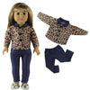 A doll wearing a casual outfit set consisting of a leopard print shirt, dark blue pants, and matching leggings.