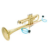 A brass trumpet and cornet instrument with cleaning tools including a piston and mouthpiece brush.