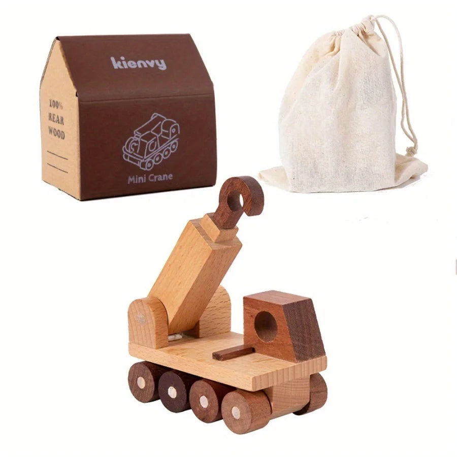 Une boîte en carton marron contenant un mini engin de construction en bois.