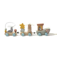 A wooden train set with numbered cars, including a gray animal car and a brown train engine.