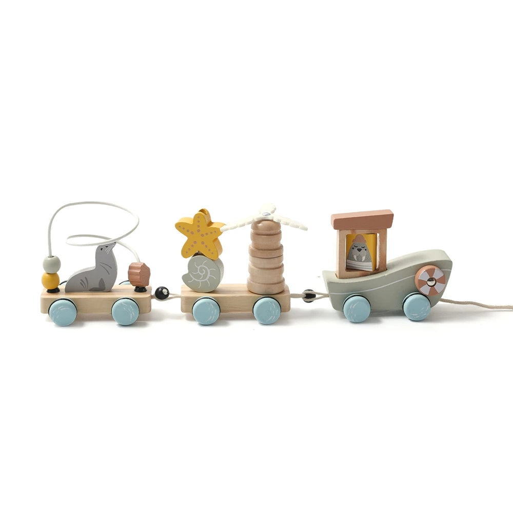A wooden train set with numbered cars, including a gray animal car and a brown train engine.