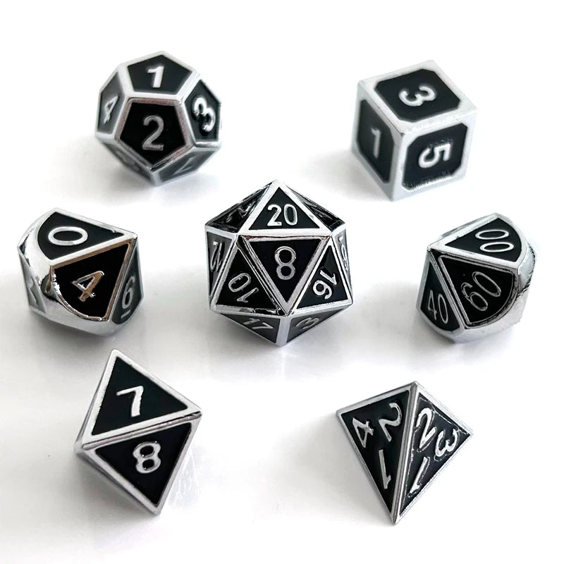 A set of premium metal polyhedral dice showing various numbers and shapes with a multicolor gold finish.