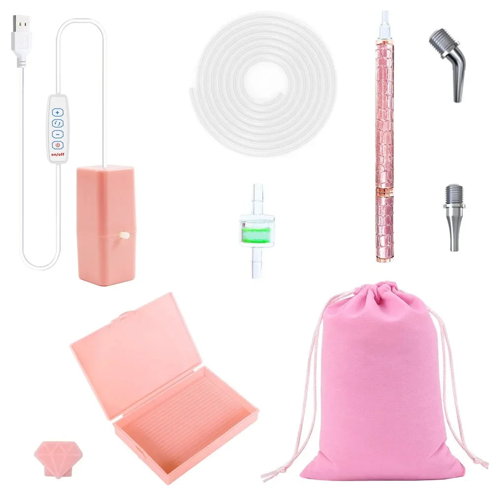 A pink electric diamond painting pen kit with a USB suction tool and storage pouch.