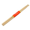 A set of professional maple wood drumsticks with rubber grips, shown diagonally.