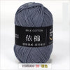 A ball of gray milk cotton yarn labeled with Chinese characters and a price tag.