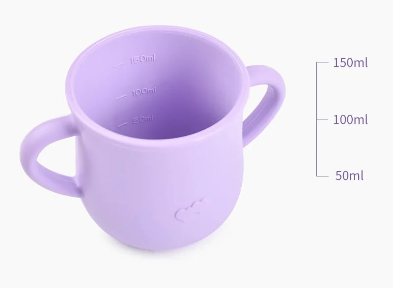 A purple BPA-free silicone snack cup with volume markings is shown against a white background.