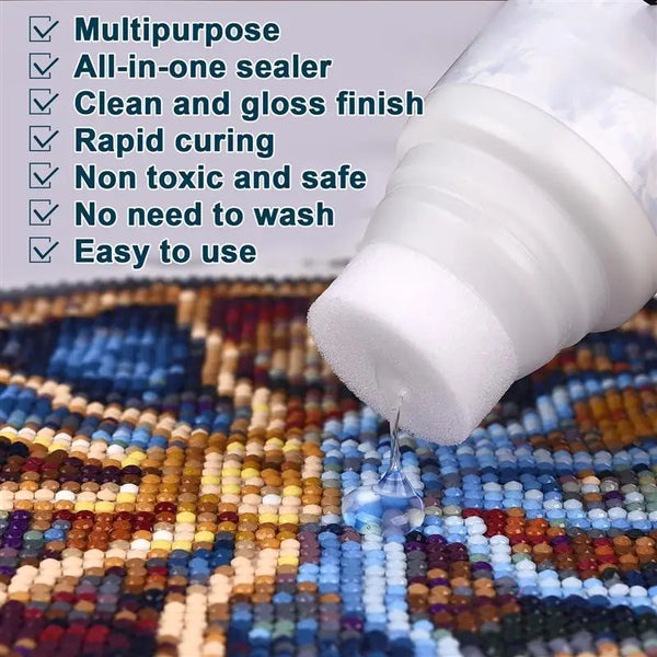 A white bottle of multipurpose all-in-one sealer glue is shown dripping onto a colorful diamond painting fabric.