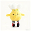A yellow plush sports ball keychain with white feathers and black feet.