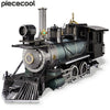 A detailed black and bronze 3D metal steam locomotive model kit with pipes and machinery.