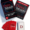 A box of Dirty Minds party game cards and a single playing card are shown on a white surface.