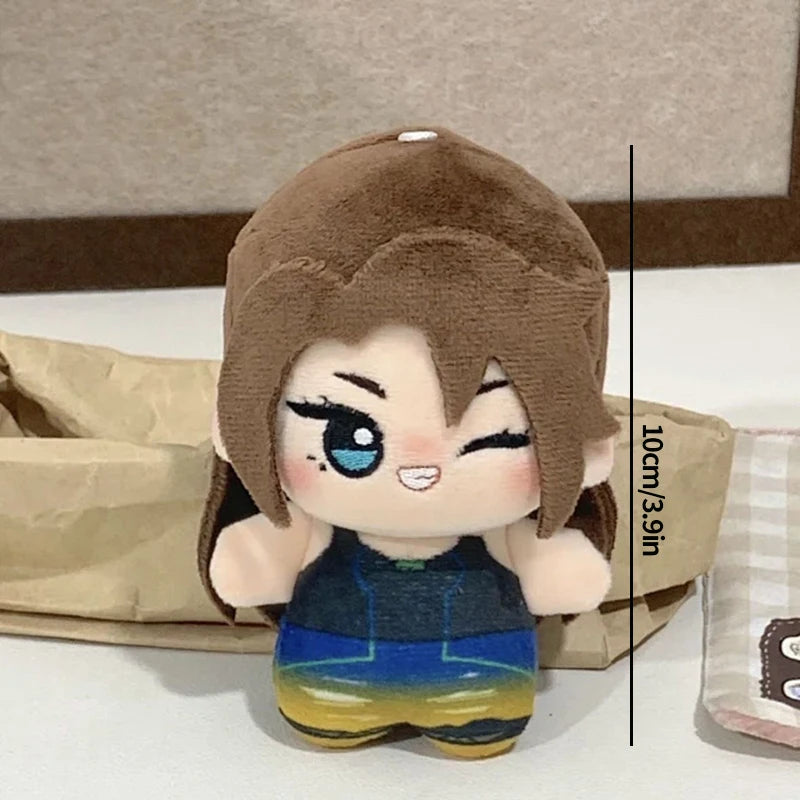 A plush keychain set featuring two characters, IVAN and TILL, with brown hair and blue accents.