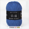 A skein of blue milk cotton yarn is shown, labeled with Chinese characters and a weight of 57 grams.