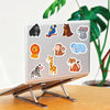 A set of ten adorable animal fridge magnets featuring various wildlife characters on a silver laptop.