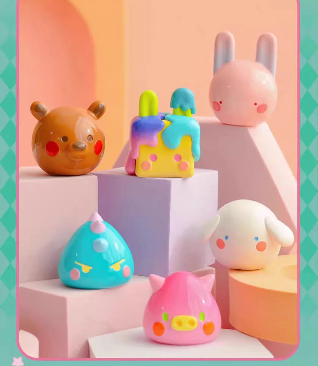 A collection of pink and yellow vinyl figures, including a pig, a rabbit, and a blue creature, displayed on pastel-colored ge