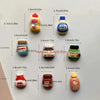 A set of eight colorful kawaii jam jar fridge magnets with various sizes and designs.
