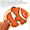 An orange clownfish magnetic puzzle piece designed for young babies.