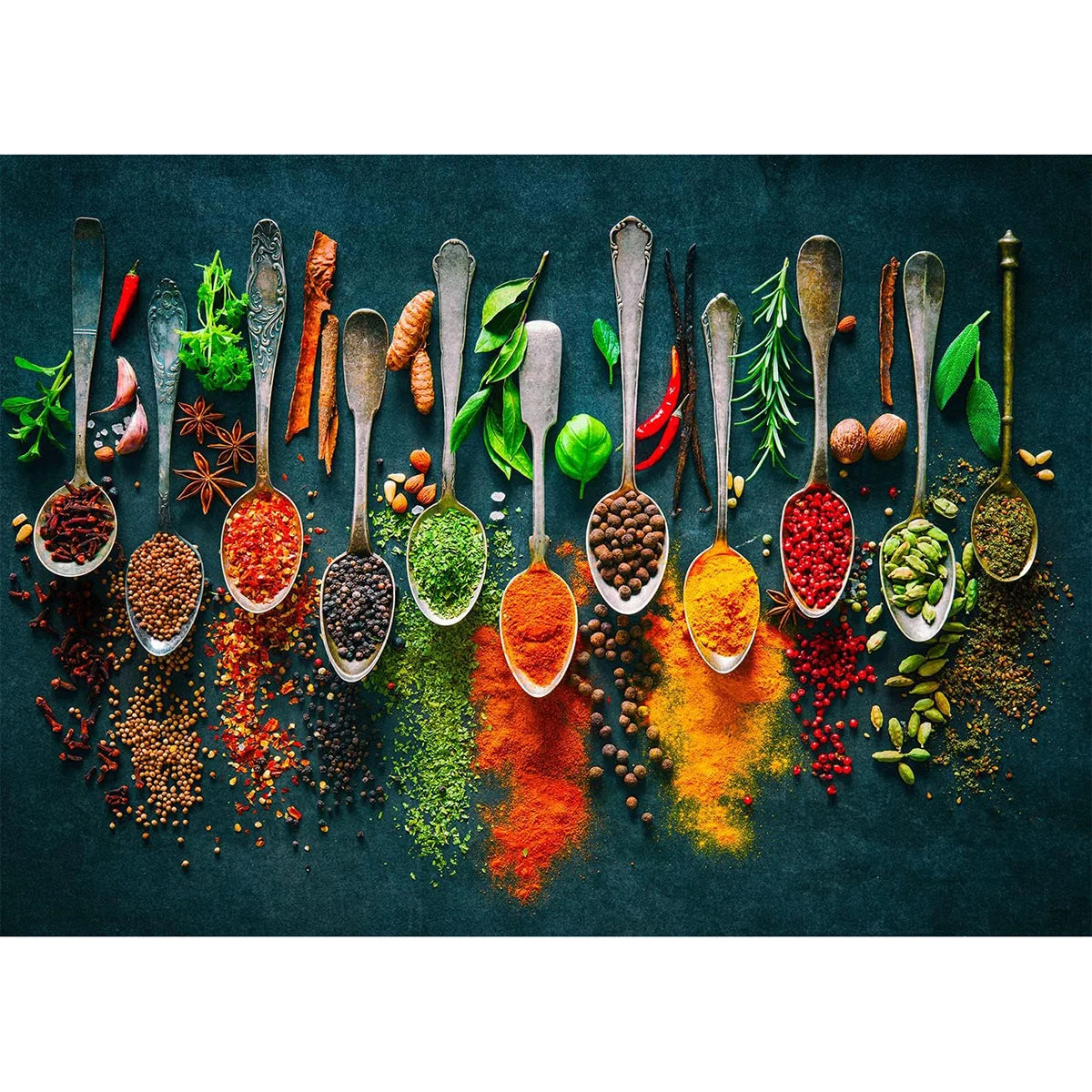 A collection of colorful spices and herbs displayed on a dark slate board, arranged with spoons.