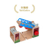 Wooden train track accessories set featuring airport and gas station scenes with blue and red components