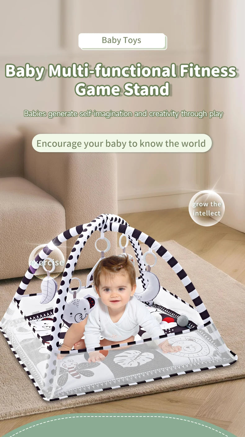 A baby is playing on a multi-functional fitness game stand mat with hanging toys and exercise elements.