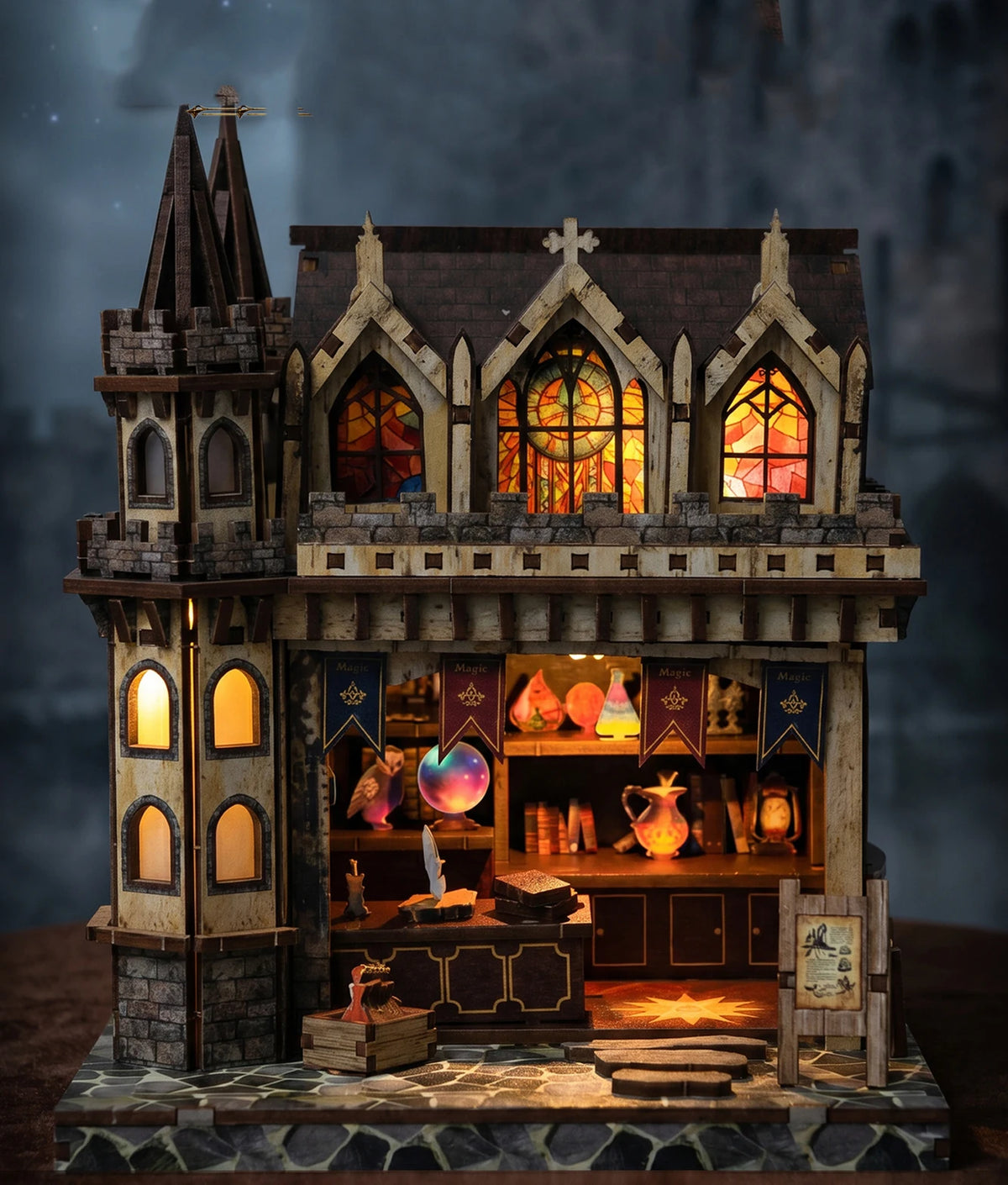 A detailed miniature kit of a wooden magic store cottage featuring intricate architecture and interior display.