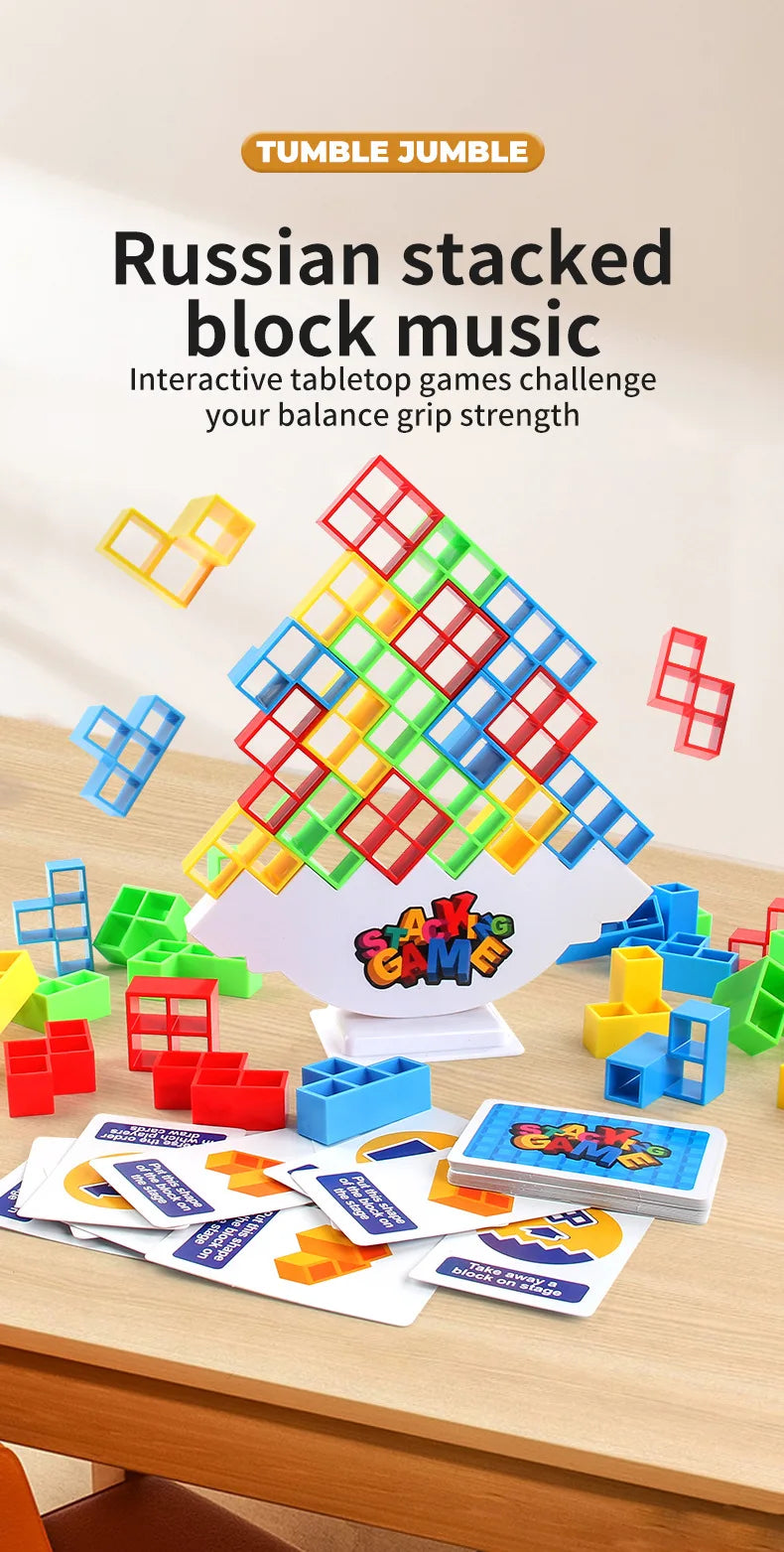 A pile of colorful wooden stacking blocks is shown with a pyramid structure, alongside game cards and a wooden table.