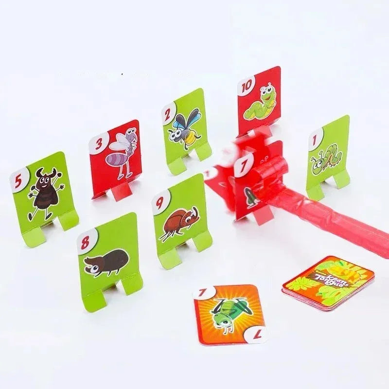 A collection of colorful cards featuring frog and insect designs used for a tongue-catching card game.