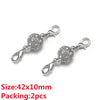 A pair of silver magnetic clasps for jewelry making, featuring textured metal connectors.