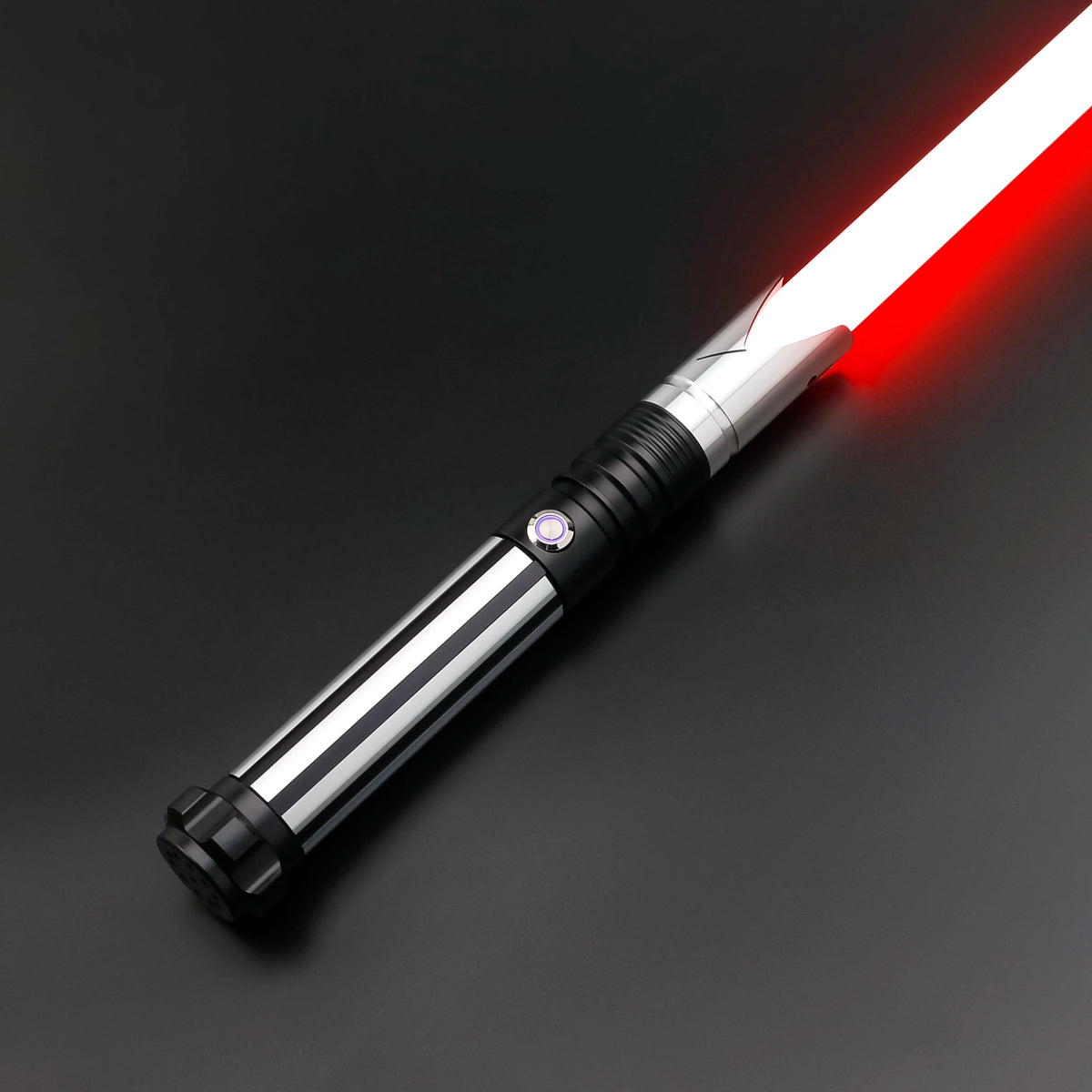 A premium metal lightsaber with an illuminated red blade and silver hilt against a dark background.