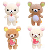 Four versions of Rilakkuma anime plush bears in various colors and with strawberry accents