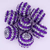 A cluster of purple and silver mixed two-tone striped resin beads for jewelry making