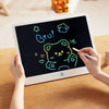 A person is drawing on a digital LCD writing tablet with a stylus, creating colorful doodles on the screen.
