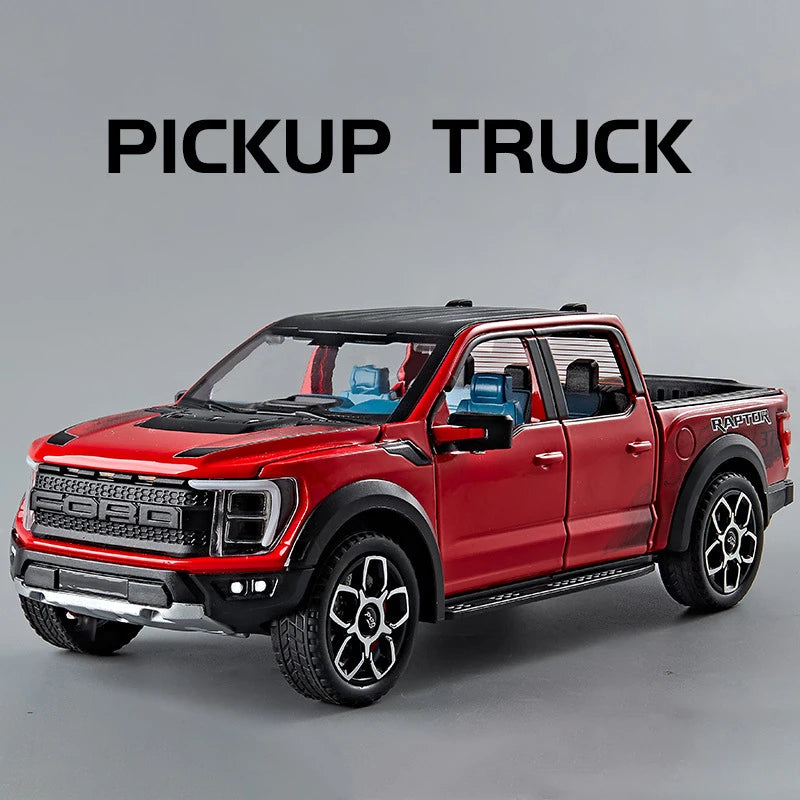 A red Ford Raptor pickup truck diecast model with black accents shown in a side profile.