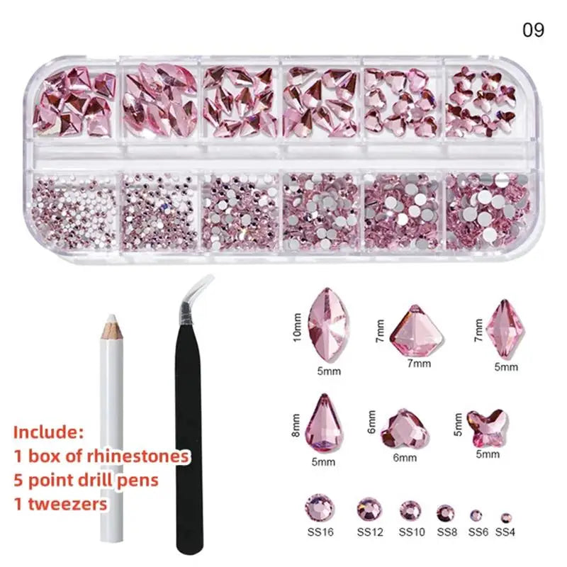 A box of pink rhinestones, glass gems, and tools including drill pens and tweezers for nail art.