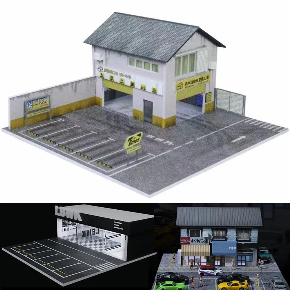 A 1:64 scale mini garage diorama featuring a white building and an asphalt parking lot for diecast cars.